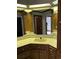 Bathroom vanity featuring unique mirror, plenty of storage, and lots of counter space at 5704 Woodside Ave., Myrtle Beach, SC 29577