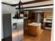 Kitchen with stainless steel refrigerator and center island at 5704 Woodside Ave., Myrtle Beach, SC 29577