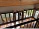 Bright living room featuring hardwood floors, wooden ceilings, multiple windows, and natural light at 5704 Woodside Ave., Myrtle Beach, SC 29577