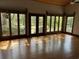 Bright and airy living room with hardwood floors and large windows overlooking the yard at 5704 Woodside Ave., Myrtle Beach, SC 29577