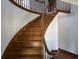 Elegant curved wooden staircase with a classic design at 5704 Woodside Ave., Myrtle Beach, SC 29577