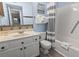 Well-lit bathroom featuring a vanity with storage, a toilet, and a shower/tub combo at 5905 S Kings Highway # 416-A, Myrtle Beach, SC 29575