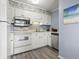 Bright kitchen with white cabinetry and stainless steel appliances at 5905 S Kings Highway # 416-A, Myrtle Beach, SC 29575