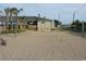 Beach volleyball court set against a scenic backdrop, ideal for enjoying friendly matches and outdoor fun at 5905 S Kings Highway # 416-A, Myrtle Beach, SC 29575