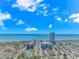 Expansive aerial view of coastal condos, pool, and ocean offering stunning waterfront living at 5905 S Kings Hwy. # 216B, Myrtle Beach, SC 29577