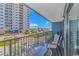 A beautiful balcony with chairs, and a view of the city at 5905 S Kings Hwy. # 216B, Myrtle Beach, SC 29575
