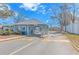 Community guard house with gray shingles, blue siding, and security features for resident safety at 5905 S Kings Hwy. # 216B, Myrtle Beach, SC 29577