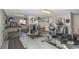 Well-equipped gym with treadmills, elliptical machines, and weightlifting equipment for residents' use at 5905 S Kings Hwy. # 216B, Myrtle Beach, SC 29575