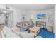 Comfortable living room with stylish decor, plush seating, and a flat-screen TV for relaxing evenings at 5905 S Kings Hwy. # 216B, Myrtle Beach, SC 29577