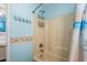 Clean bathroom with shower and seashell themed decor at 6001- 1222 S Kings Highway, Myrtle Beach, SC 29575