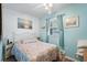 Comfortable bedroom with seaside themed decor and a ceiling fan at 6001- 1222 S Kings Highway, Myrtle Beach, SC 29575