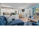 Inviting living area and kitchen with cozy seating, adjacent to a dining area bathed in sunlight at 6001- 1222 S Kings Highway, Myrtle Beach, SC 29575