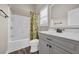 Bright bathroom featuring a vanity, toilet, and shower with a decorative curtain at 6001 - Mh69B South Kings Hwy., Myrtle Beach, SC 29575