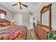 Comfortable bedroom with a wooden dresser and a glimpse into another room through the open doorway at 6001 - Mh69B South Kings Hwy., Myrtle Beach, SC 29575