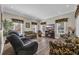 Cozy living room with comfortable seating, fireplace, and great natural light at 6001 - Mh69B South Kings Hwy., Myrtle Beach, SC 29575