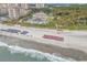 Picturesque aerial view highlighting the beachfront location, resort amenities, and ocean scenery at 6013 Tramonto St., Myrtle Beach, SC 29577