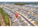 Bird's-eye view highlighting the neighborhood's layout, landscaping, and proximity to urban areas at 6013 Tramonto St., Myrtle Beach, SC 29577