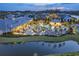 Nighttime aerial view of the resort-style pool, clubhouse, and community amenities by the water at 6013 Tramonto St., Myrtle Beach, SC 29577