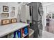 Well-organized laundry room with modern washer and dryer and counter space with storage at 6013 Tramonto St., Myrtle Beach, SC 29577