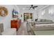 Cozy living room with a ceiling fan, TV, comfortable seating, and sliding glass doors leading to the outside at 6013 Tramonto St., Myrtle Beach, SC 29577