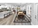 Open concept living space featuring a dining area and kitchen with lots of natural light and stylish decor at 6013 Tramonto St., Myrtle Beach, SC 29577