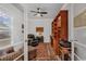 Cozy home office with built-in bookshelves, comfortable seating and an abundance of light at 6013 Tramonto St., Myrtle Beach, SC 29577