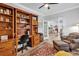 Bright office with custom built-ins and comfortable seating near an open doorway at 6013 Tramonto St., Myrtle Beach, SC 29577
