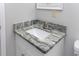Close up of a bathroom sink with granite countertop and chrome faucet at 602 Luttie Rd., Myrtle Beach, SC 29588