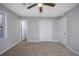 Neutral bedroom with fan, light paint, and closet space at 602 Luttie Rd., Myrtle Beach, SC 29588