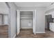 Spacious pantry with open shelving and hardwood style flooring close to the kitchen at 602 Luttie Rd., Myrtle Beach, SC 29588