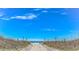 Direct beach access with sandy path leading to the ocean at 609 Hillside Dr. S. # E-18, North Myrtle Beach, SC 29582