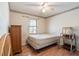 Bedroom featuring window, ceiling fan and wood flooring providing a comfortable living space at 616 Mckinley Way, Conway, SC 29526