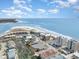 Aerial view of beach side properties, the ocean, and water inlets at 6200 N Ocean Blvd. # 501, North Myrtle Beach, SC 29582