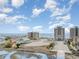 Aerial view of multi-story condominiums near the ocean and the beach at 6200 N Ocean Blvd. # 501, North Myrtle Beach, SC 29582