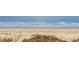 View of the sandy beach and ocean at 6200 N Ocean Blvd. # 501, North Myrtle Beach, SC 29582