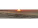 Ocean front view featuring vibrant sunsets over the water with the sky ablaze with color at 6200 N Ocean Blvd. # 501, North Myrtle Beach, SC 29582