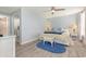 Comfortable bedroom featuring light blue walls and white wicker furniture at 6200 N Ocean Blvd. # 501, North Myrtle Beach, SC 29582