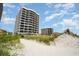 Exterior of modern condominiums from beach at 6200 N Ocean Blvd. # 501, North Myrtle Beach, SC 29582