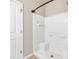 Clean bathroom featuring a shower with a built-in seat and shelving at 675 Pistoia Ln. # 675, Myrtle Beach, SC 29579