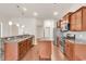 Well-appointed kitchen boasting stainless steel appliances, granite countertops, a kitchen island, and modern lighting at 675 Pistoia Ln. # 675, Myrtle Beach, SC 29579