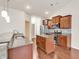 Bright kitchen featuring stainless steel appliances, granite countertops, a kitchen island, and modern pendant lighting at 675 Pistoia Ln. # 675, Myrtle Beach, SC 29579