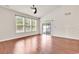 Bright living room with ceiling fan and sliding glass door at 675 Pistoia Ln. # 675, Myrtle Beach, SC 29579