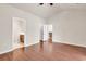 Spacious main bedroom featuring hardwood floors and multiple doorways at 675 Pistoia Ln. # 675, Myrtle Beach, SC 29579
