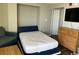 Cozy bedroom features seating, storage and sleeping areas at 6804 N Ocean Blvd. # 1237, Myrtle Beach, SC 29572