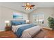 Staged bedroom with vaulted ceiling, natural light, and wooden floors showcasing relaxing home comforts at 7377 Guinevere Circle, Myrtle Beach, SC 29588