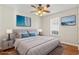 Comfortable bedroom showcasing a ceiling fan, window, and decor at 7377 Guinevere Circle, Myrtle Beach, SC 29588