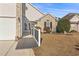 Beautiful home featuring a ramp that leads to the front door and manicured bushes in the front yard at 7377 Guinevere Circle, Myrtle Beach, SC 29588