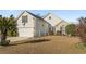 Charming home featuring an attached two car garage, ramp, and a nicely landscaped yard at 7377 Guinevere Circle, Myrtle Beach, SC 29588