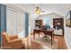 Charming home office featuring a comfortable chair, desk, and built-in bookshelves at 7377 Guinevere Circle, Myrtle Beach, SC 29588