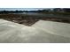 Sidewalks being added to the home construction site, view of the surrounding homes and pond at 899 Agostino Dr., Myrtle Beach, SC 29579
